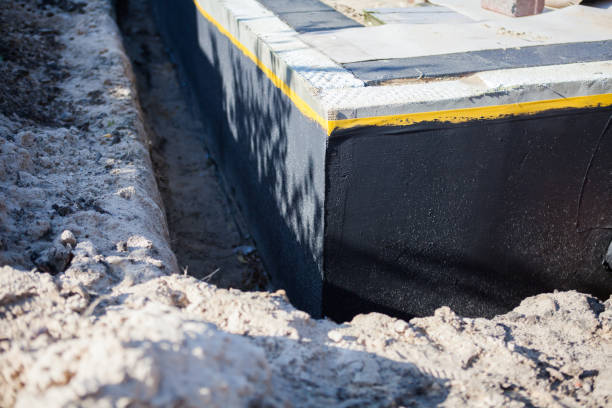 Professional Emergency Waterproofing technician working in Cecil, WI